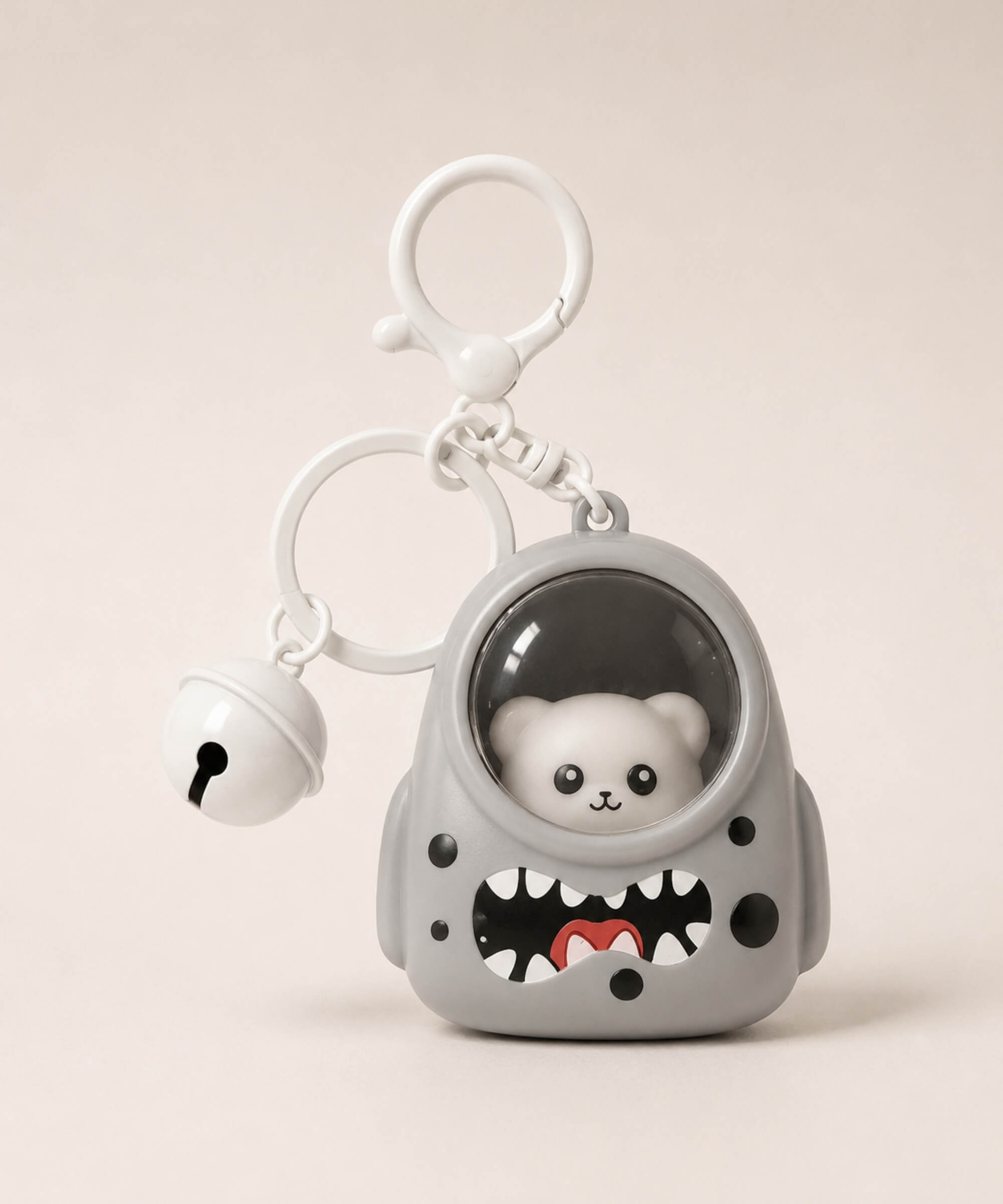 Grey cat light-up backpack keychain with white bell charm